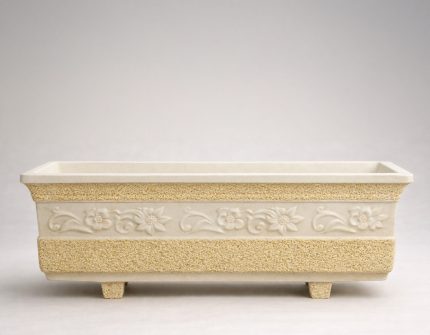 Floreira em brita com flores grande